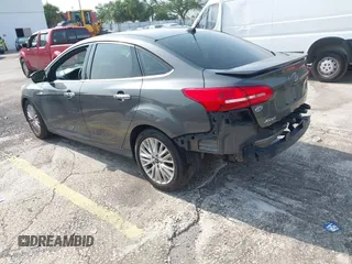 2018 Ford Focus Titanium с VIN 1FADP3J23JL272028, выставлен на аукционе IAAI как лот 42395402 с пробегом 125 975 миль миль и . История ставок и продаж доступна на DreamBid. Изображение 3.