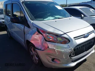 2016 Ford Transit Connect XLT with VIN NM0AE8F78G1230587, listed as a IAAI auction lot 41643706 with 98,957 mi miles and . Bid and sale history available at DreamBid. Image 6.