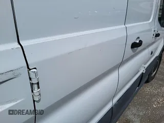 2016 Ford Transit Cargo with VIN 1FTYE1ZM1GKA06047, listed as a IAAI auction lot 42679265 with 124,601 mi miles and . Bid and sale history available at DreamBid. Image 23.