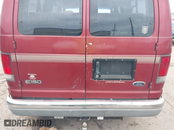 1999 Ford Econoline Cargo with VIN 1FDRE14W0XHB06565, listed as a IAAI auction lot 41496511 with 165,268 mi miles. Bid and sale history available at carsss.com. Image 14.