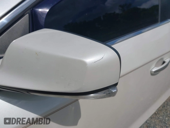 2013 Buick LaCrosse Premium 1 with VIN 1G4GF5E35DF318661, listed as a IAAI auction lot 42757734 with 259,103 mi miles and . Bid and sale history available at DreamBid. Image 13.