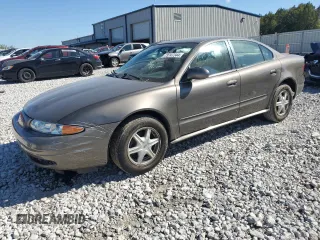 2002 Oldsmobile Alero GL1 z VIN 1G3NL52F42C167569, wystawiony jako Copart lot #73747344 z przebiegiem 156 355 mil mil oraz Tytuł czysty. Historia ofert i sprzedaży dostępna na DreamBid. Obrazek 1.