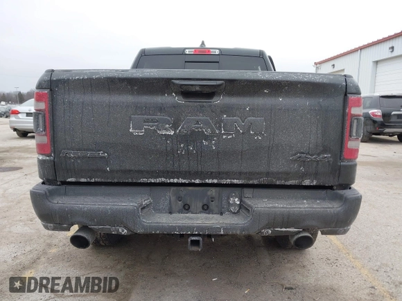 2019 Ram 1500 Rebel z VIN 1C6SRFLT6KN599362, wystawiony jako IAAI lot #41560018 z przebiegiem Nie podano mil oraz . Historia ofert i sprzedaży dostępna na DreamBid. Obrazek 16.