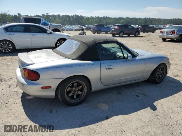 1999 Mazda MX-5 Miata z VIN JM1NB3538X0112611, wystawiony jako Copart lot #54732095 z przebiegiem 173 763 mil mil oraz Szkoda całkowita • Salvage title. Historia ofert i sprzedaży dostępna na DreamBid. Obrazek 3.