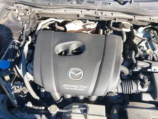 2015 Mazda 3 i Sport with VIN 3MZBM1U72FM210435, listed as a IAAI auction lot 41744470 with 148,624 mi miles. Bid and sale history available at carsss.com. Image 10.