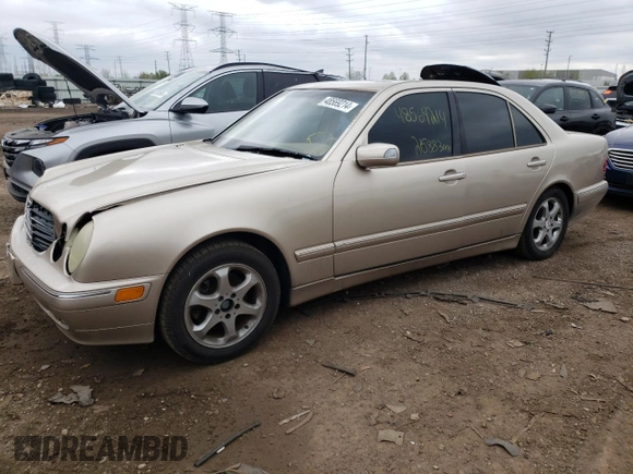 2002 Mercedes-Benz E-Class with VIN WDBJF65J12B463150, listed as a Copart auction lot 74434654 with 215,883 mi miles and Salvage Title. Bid and sale history available at carsss.com. Image 1.