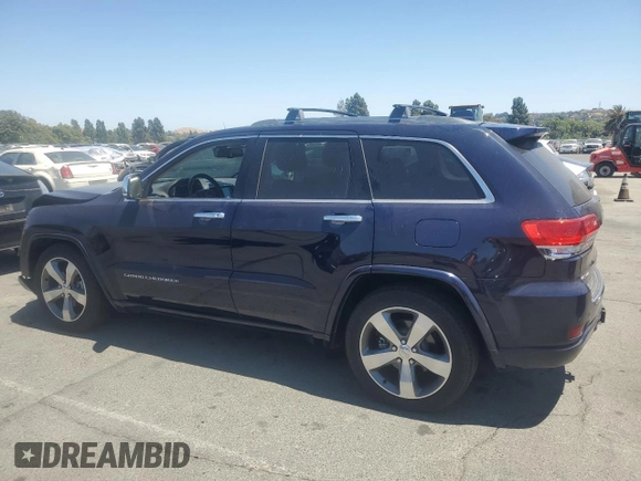 2015 Jeep Grand Cherokee Overland with VIN 1C4RJFCG0FC629863, listed as a Copart auction lot 63098475 with 92,426 mi miles and Salvage title. Bid and sale history available at DreamBid. Image 2.