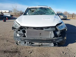 2013 Hyundai Santa Fe Sport z VIN 5XYZT3LB2DG021803, wystawiony jako IAAI lot #41195838 z przebiegiem Nie podano mil oraz . Historia ofert i sprzedaży dostępna na DreamBid. Obrazek 12.