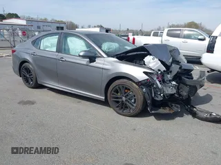 2025 Toyota Camry LE with VIN 4T1DAACK6SU565152, listed as a IAAI auction lot 41825174 with 297 mi miles and . Bid and sale history available at DreamBid. Image 1.