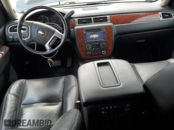 2014 Chevrolet Tahoe LTZ with VIN 1GNSKCE0XER228028, listed as a Copart auction lot 56971135 with 155,285 mi miles and Salvage title. Bid and sale history available at DreamBid. Image 8.