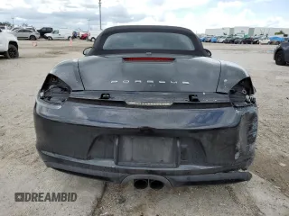 2013 Porsche Boxster z VIN WP0CA2A84DS114538, wystawiony jako Copart lot #69744684 z przebiegiem 49 295 mil mil oraz Szkoda całkowita • Salvage title. Historia ofert i sprzedaży dostępna na DreamBid. Obrazek 6.