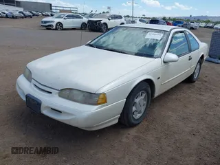 1995 Ford Thunderbird LX with VIN 1FALP62W1SH168074, listed as a IAAI auction lot 41995575 with 232,742 mi miles. Bid and sale history available at carsss.com. Image 2.