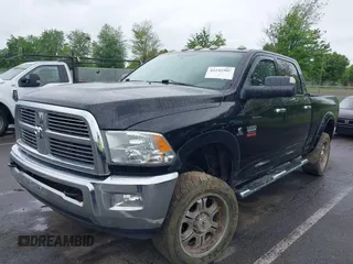 2012 Ram 2500 Big Horn z VIN 3C6UD5DL2CG142378, wystawiony jako IAAI lot #42242505 z przebiegiem Nie podano mil oraz . Historia ofert i sprzedaży dostępna na DreamBid. Obrazek 2.