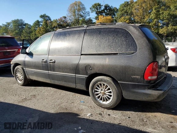 1999 Chrysler Town & Country LXi with VIN 1C4GP64L1XB599412, listed as a Copart auction lot 76901614 with Not Provided miles and Salvage Title. Bid and sale history available at carsss.com. Image 2.