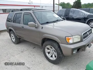 2002 Nissan Pathfinder SE z VIN JN8DR09Y42W717800, wystawiony jako IAAI lot #42216526 z przebiegiem 214 149 mil mil oraz . Historia ofert i sprzedaży dostępna na DreamBid. Obrazek 1.