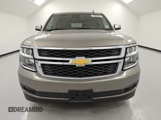 2019 Chevrolet Tahoe LT with VIN 1GNSCBKC0KR100687, listed as a Copart auction lot 53123455 with 104,006 mi miles and Clean title. Bid and sale history available at DreamBid. Image 5.