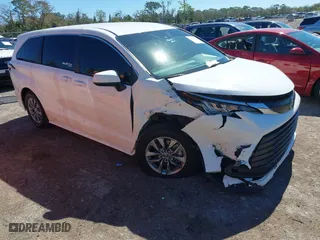 2023 Toyota Sienna LE with VIN 5TDKRKEC2PS173314, listed as a IAAI auction lot 41601728 with 50,873 mi miles. Bid and sale history available at carsss.com. Image 1.