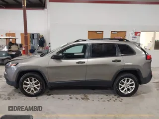 2016 Jeep Cherokee Sport with VIN 1C4PJMAB5GW246889, listed as a IAAI auction lot 40847921 with 164,210 mi miles. Bid and sale history available at carsss.com. Image 14.
