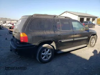 2004 GMC Envoy SLT with VIN 1GKET16S446131726, listed as a Copart auction lot 76033954 with Not Provided miles and Salvage Title. Bid and sale history available at DreamBid. Image 3.