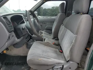 2000 Nissan Frontier XE with VIN 1N6DD26SXYC400648, listed as a Copart auction lot 58756855 with 148,051 mi miles and Salvage title. Bid and sale history available at DreamBid. Image 7.