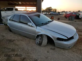2000 Cadillac Seville Touring STS z VIN 1G6KY5494YU201138, wystawiony jako Copart lot #73485584 z przebiegiem 137 913 mil mil oraz Szkoda całkowita • Salvage title. Historia ofert i sprzedaży dostępna na DreamBid. Obrazek 4.