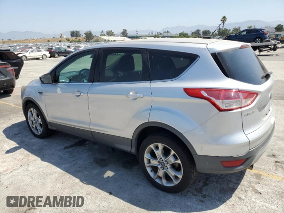 2013 Ford Escape SEL with VIN 1FMCU9H98DUB01757, listed as a Copart auction lot 63626185 with 189,695 mi miles and Clean title. Bid and sale history available at DreamBid. Image 2.