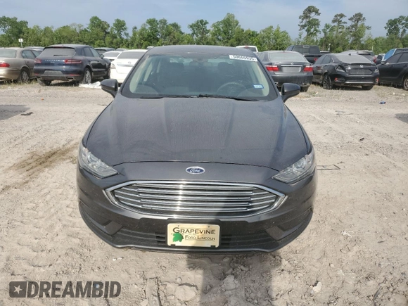 2017 Ford Fusion SE z VIN 3FA6P0H73HR294017, wystawiony jako Copart lot #50665935 z przebiegiem 62 426 mil mil oraz Czysty tytuł • Clean title. Historia ofert i sprzedaży dostępna na DreamBid. Obrazek 5.
