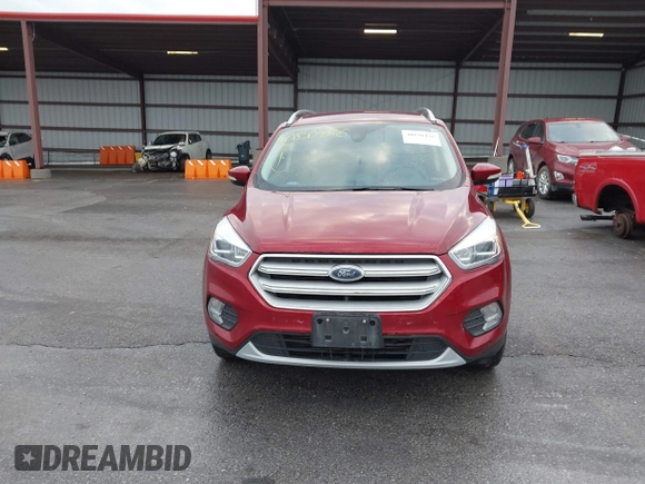 2019 Ford Escape Titanium z VIN 1FMCU9J99KUA18880, wystawiony jako IAAI lot #40830436 z przebiegiem 117 499 mil mil oraz . Historia ofert i sprzedaży dostępna na DreamBid. Obrazek 12.