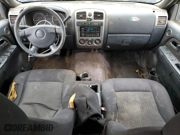 2007 GMC Canyon SLE1 z VIN 1GTDS13E178129031, wystawiony jako Copart lot #44825775 z przebiegiem 249 940 mil mil oraz Czysty tytuł • Clean title. Historia ofert i sprzedaży dostępna na DreamBid. Obrazek 8.