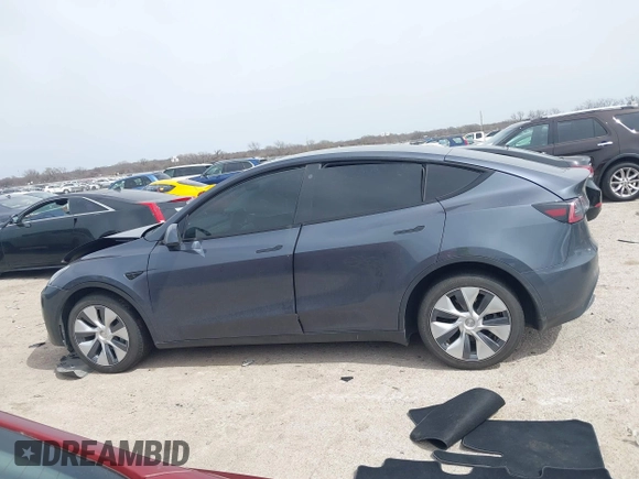 2023 Tesla Model Y Long Range with VIN 7SAYGDEE0PA036048, listed as a IAAI auction lot 41775845 with 41,291 mi miles. Bid and sale history available at carsss.com. Image 13.
