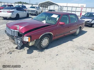 1999 Cadillac DeVille with VIN 1G6KD54Y8XU771788, listed as a IAAI auction lot 41734590 with 84,302 mi miles. Bid and sale history available at carsss.com. Image 17.
