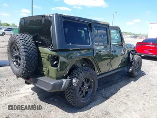 2024 Jeep Wrangler Willys with VIN 1C4PJXDG8RW236725, listed as a IAAI auction lot 39128397 with 50 mi miles and . Bid and sale history available at DreamBid. Image 4.
