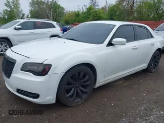 2014 Chrysler 300 S with VIN 2C3CCABG9EH355602, listed as a IAAI auction lot 42244756 with 165,816 mi miles and . Bid and sale history available at DreamBid. Image 17.