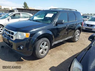 2010 Ford Escape XLT with VIN 1FMCU0DG6AKB52973, listed as a IAAI auction lot 41966024 with 137,774 mi miles. Bid and sale history available at carsss.com. Image 2.