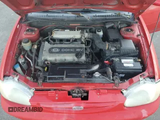 2001 Kia Sephia z VIN KNAFB121715066725, wystawiony jako Copart lot #86552964 z przebiegiem 76 915 mil mil oraz Tytuł czysty. Historia ofert i sprzedaży dostępna na DreamBid. Obrazek 11.