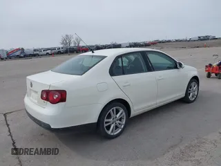 2008 Volkswagen Jetta Sedan S with VIN 3VWJZ71K58M075639, listed as a IAAI auction lot 41855222 with 142,902 mi miles. Bid and sale history available at carsss.com. Image 4.