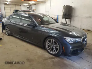 2019 BMW 7 Series 740i xDrive with VIN WBA7E4C51KGV70174, listed as a Copart auction lot 54117075 with 48,743 mi miles and Salvage Title. Bid and sale history available at carsss.com. Image 4.
