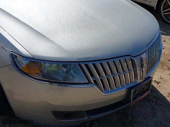 2010 Lincoln MKZ with VIN 3LNHL2GC4AR625438, listed as a IAAI auction lot 41821339 with 129,211 mi miles. Bid and sale history available at carsss.com. Image 6.