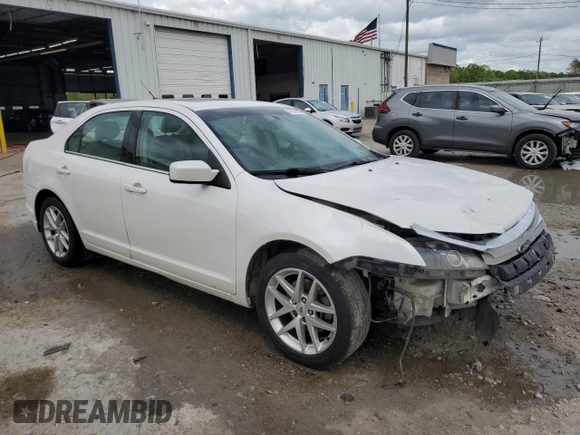 2012 Ford Fusion SEL z VIN 3FAHP0JA3CR184074, wystawiony jako Copart lot #51973675 z przebiegiem 192 732 mil mil oraz Szkoda całkowita • Salvage title. Historia ofert i sprzedaży dostępna na DreamBid. Obrazek 4.