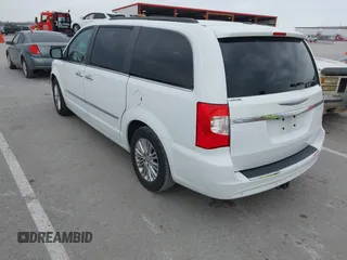 2015 Chrysler Town & Country Touring-L with VIN 2C4RC1CG9FR573863, listed as a IAAI auction lot 42036034 with 141,390 mi miles. Bid and sale history available at carsss.com. Image 3.