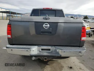 2005 Nissan Titan SE with VIN 1N6AA07B65N566082, listed as a Copart auction lot 80879174 with 215,297 mi miles and Clean Title. Bid and sale history available at carsss.com. Image 6.