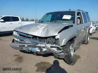 2004 Chevrolet Tahoe LS with VIN 1GNEC13T64J282970, listed as a IAAI auction lot 41879458 with 205,952 mi miles. Bid and sale history available at carsss.com. Image 17.