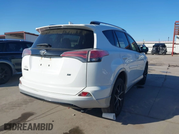 2016 Toyota RAV4 SE with VIN JTMNFREV9GJ069030, listed as a IAAI auction lot 41966346 with 168,417 mi miles and . Bid and sale history available at DreamBid. Image 4.