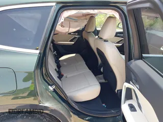 2024 BMW X1 xDrive28i with VIN WBX73EF0XR5Z23986, listed as a IAAI auction lot 42429719 with 13,381 mi miles and . Bid and sale history available at DreamBid. Image 8.