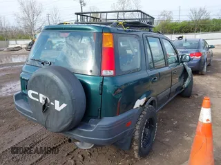 2000 Honda CR-V EX with VIN JHLRD1865YC029209, listed as a IAAI auction lot 41995621 with 172,505 mi miles. Bid and sale history available at carsss.com. Image 4.