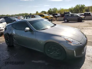 2015 Nissan 370Z with VIN JN1AZ4EH2FM444159, listed as a Copart auction lot 71005944 with 54,063 mi miles and Salvage Title. Bid and sale history available at carsss.com. Image 4.