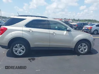 2015 Chevrolet Equinox LT z VIN 2GNALBEK4F6296410, wystawiony jako IAAI lot #42325053 z przebiegiem 115 012 mil mil oraz . Historia ofert i sprzedaży dostępna na DreamBid. Obrazek 14.