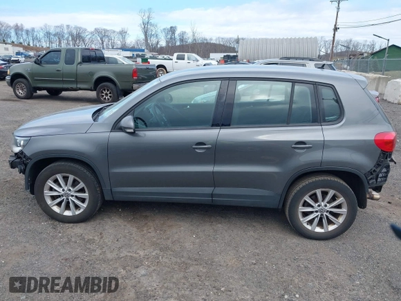 2017 Volkswagen Tiguan S with VIN WVGBV7AX9HK049420, listed as a IAAI auction lot 41838301 with 118,490 mi miles and . Bid and sale history available at DreamBid. Image 14.