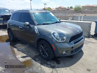 2014 MINI Countryman S with VIN WMWZC3C59EWP29137, listed as a IAAI auction lot 42661922 with 128,064 mi miles and . Bid and sale history available at DreamBid. Image 1.