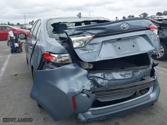2021 Toyota Corolla SE with VIN JTDS4MCE8MJ065982, listed as a IAAI auction lot 41734972 with 59,039 mi miles. Bid and sale history available at carsss.com. Image 3.
